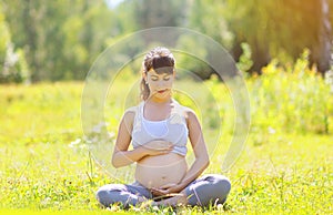 Pregnant beautiful woman yoga