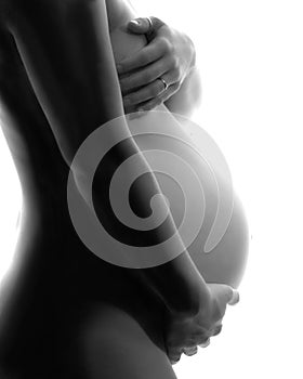 Pregnant beauty in black & white profile