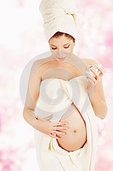 Pregnant Beauty Skin Care, Pregnancy Woman Applying Moisturizing