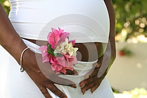 Pregnant belly with flowers