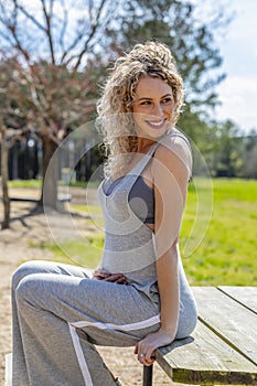 Pregnant Blonde Model At A Local Park