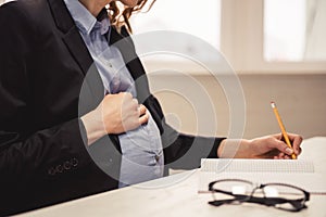 Pregnant business woman