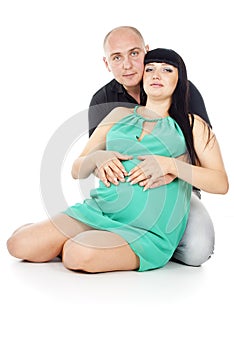 Pregnant couple hugging
