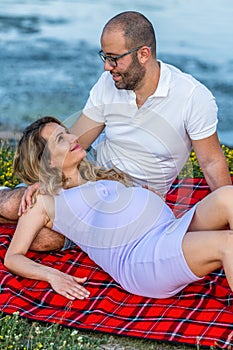 Pregnant couple outdoors