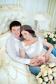 Pregnant family: husband and wife waiting for baby's birth