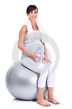 Pregnant female person, fitness and ball for studio, wellness and exercise for motherhood in pregnancy. Maternal woman