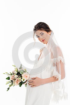 pregnant fiancee holding wedding bouquet while