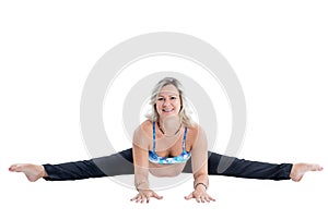 Pregnant fitness woman make stretch on yoga pose