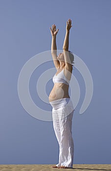 Pregnant girl on the beach