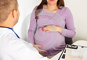 Pregnant girl at the doctor\'s consultation. Urinalysis study, bacteria and protein in the urine.