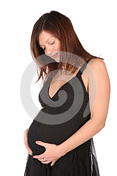 Pregnant girl embraces belly 2