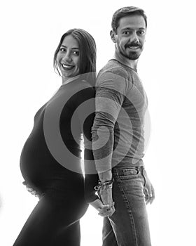 Pregnant girl and her partner back to back