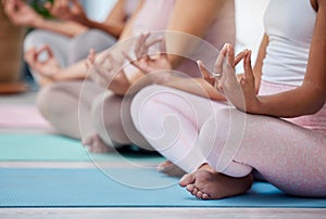 Pregnant, hands or women in yoga meditation exercise or workout class in zen fitness studio. Pregnancy, wellness or