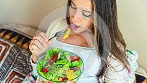 Pregnant healthy eating salad. Pregnancy woman eating nutrition healthy food. Healthy breakfast concept.