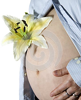 Pregnant holding flower