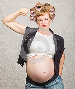 Pregnant Lady Flexing Muscles photo