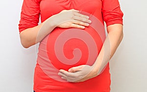 Pregnant Lady Holding Belly