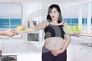 Pregnant mother reject fast food