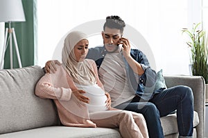Pregnant Muslim Woman Suffering Labor Pain At Home, Her Husband Calling Doctor