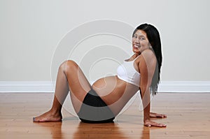 Pregnant Peruvian woman exercising