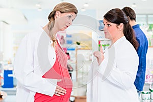 Pregnant pharmacist in protective employment ban