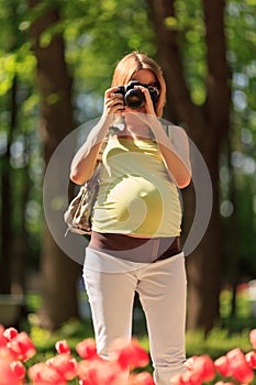 Pregnant photographer