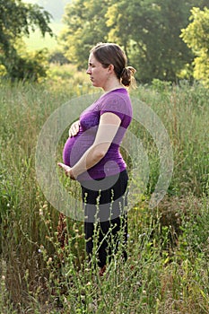 Pregnant and relaxing in nature