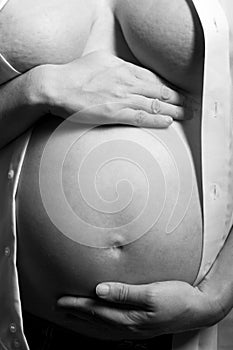 Pregnant tummy of a loving expectant mother