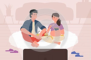 Pregnant wife and husband watch tv series or movie, couple sitting on carpet and eating