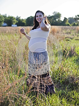 Pregnant woman with apple