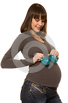 Pregnant woman with baby bootee