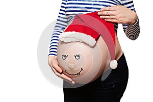 Pregnant Woman. Baby Bump with Santa Hat