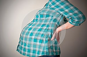 Pregnant woman with back ache