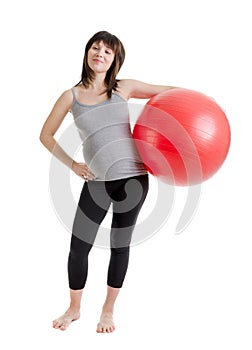 Pregnant woman with a ball