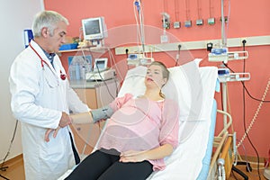 Pregnant woman being monitored by doctor