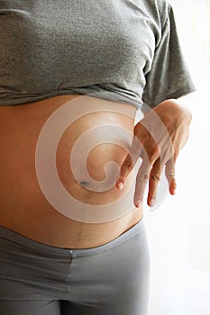 Pregnant woman belly. Pregnancy concept