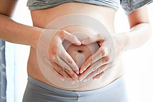 Pregnant woman belly. Pregnancy concept