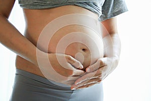 Pregnant woman belly. Pregnancy concept