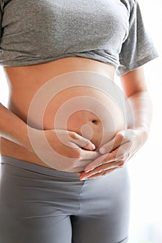 Pregnant woman belly. Pregnancy concept