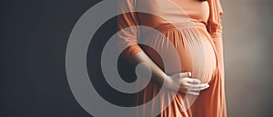 Pregnant woman belly . Pregnant woman holding hands around her belly . Pregnancy concept