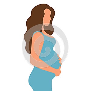 Pregnant woman with a big belly. Girl with long hair and in a dress. The joy of motherhood. Waiting for the birth of a child.