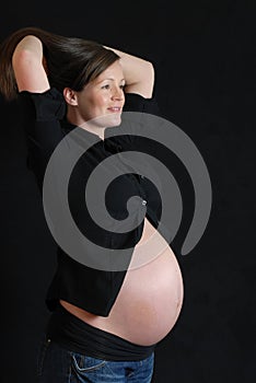 Pregnant woman in black