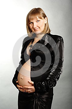 Pregnant woman in black suite