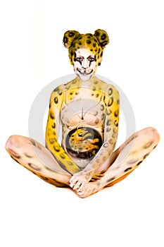Pregnant woman with body-art as leopard