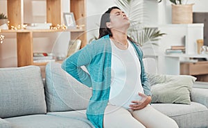 Pregnant woman, breathing and stomach pain on sofa in living room for childbirth wellness, pregnancy healthcare or