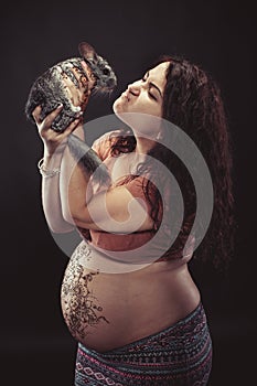 Pregnant woman with chinchilla