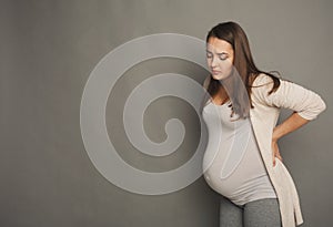 Pregnant woman with contractions or back pain