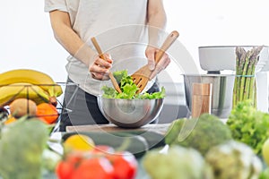 Pregnant woman cooking healthy food