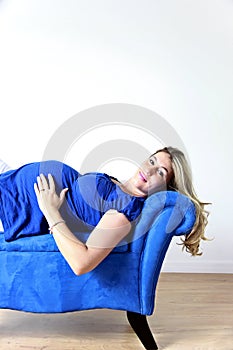 Pregnant woman on couch