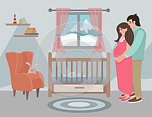 Pregnant woman at the crib. Couple in love. Christmas and New Year. Children\'s bedroom with a crib, books, an armchair.
